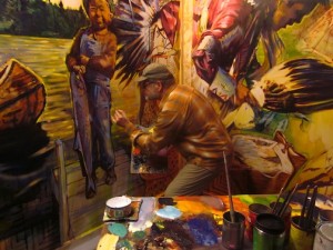 David Gilsvik works on one of the murals for the Grand Portage National Monument Heritage Center.