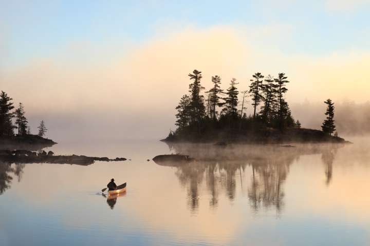 "Paddling to Sunrise" by Dawn LaPointe is one of the photographs featured in the Frozen Photographers show which opens at the Johnson Heritage Post on Friday.