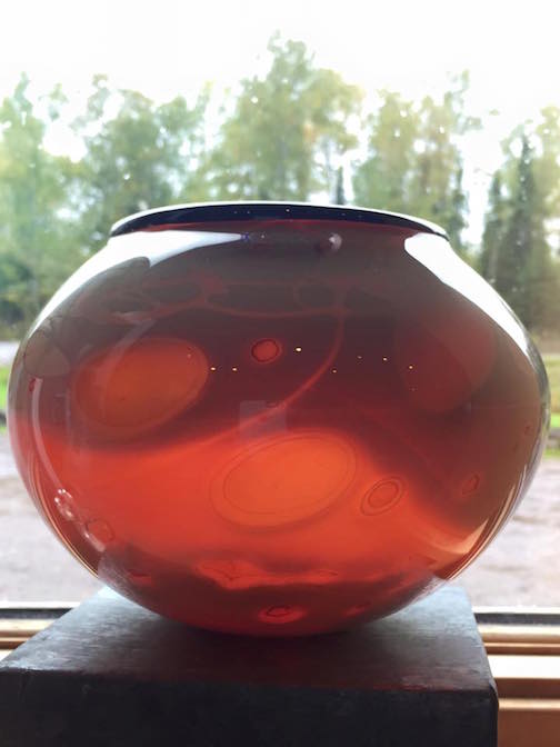 Glass vase by Tony Scorza.