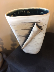 Unflurled with Blue, porcelain, by Lenore Lampi is at the gallery store at the Grand Marais Art Colony.