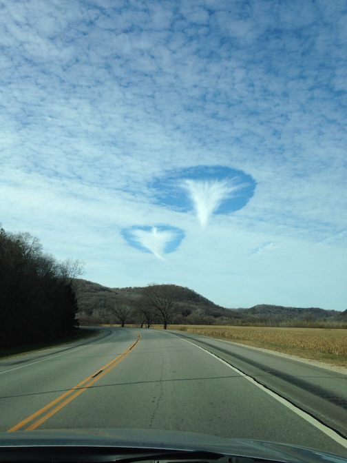 Fall streak holes or hole-punch clouds, spotted near Houston, Texas.