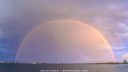 A perfect rainbow sunset over Grand Marais by Bryan Hansel.
