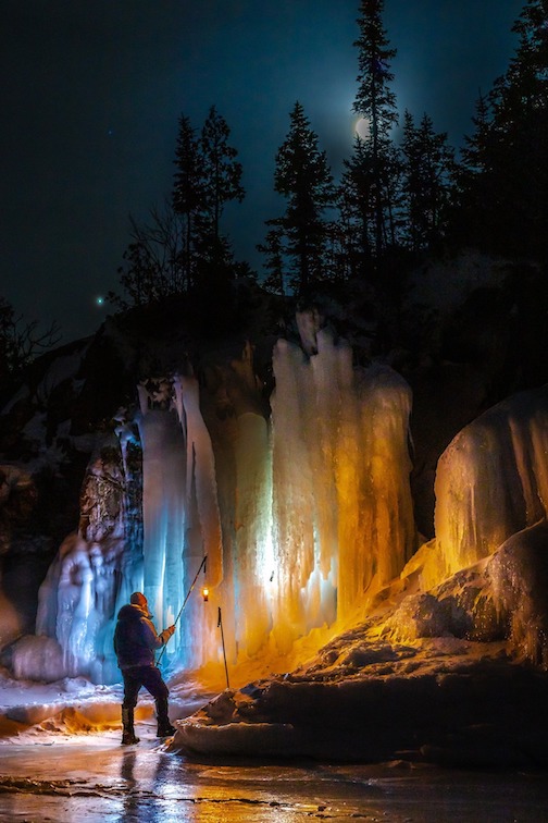 Ice falls, lights and the full moon by Jeffrey Doty