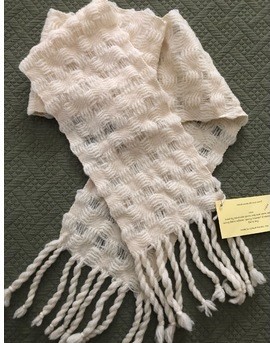 A handwoven wood scarf by Pat Zankman is one of the items featured in the WISE online auction.