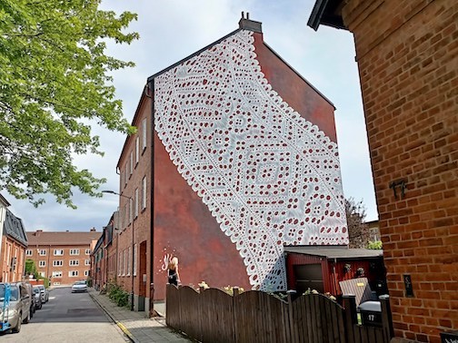A lace-painted house in MNeSpoon in Malmö sweeden  painted by NeSpoon for Artscape Festival 2021.