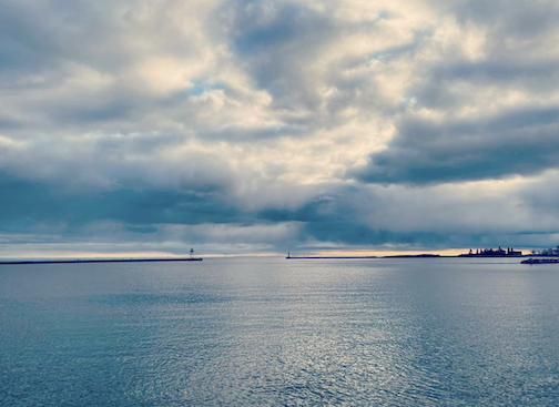 Clouds over the harbor by Sarah Jorgenson.