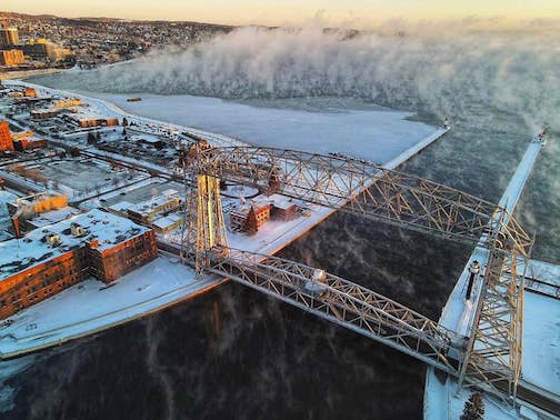Sea smoke, ice and the Lift Bridge by AJ Miller.