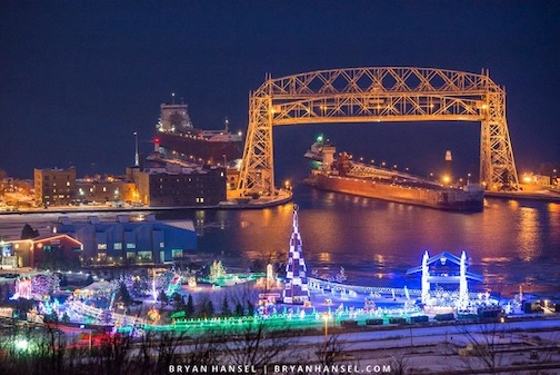 Bryan Hansel took this photo of two ships in the Duluth shipping canal with the Bentleyville Christmas lights in the foreground. Every time he publishes the photo, people often claim it is faked. It is not. To read more, click here.
