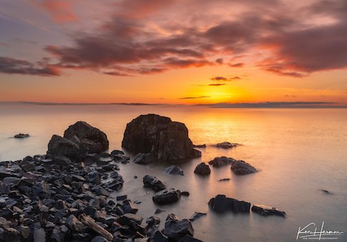 Lake Superior rocks and sunrise. Photo by Ken Harmon.