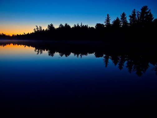 A Northwoods sunset by Ray Colby.