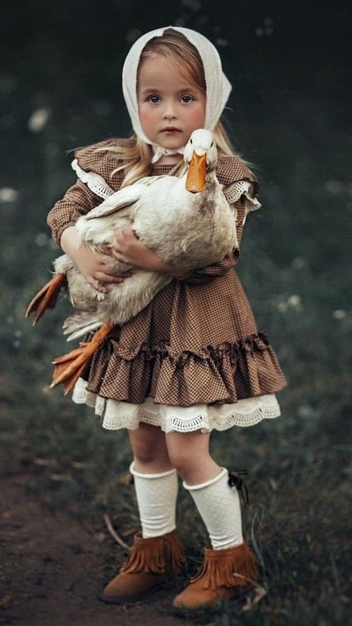 The goose and the Girl.  Photographer unknown.