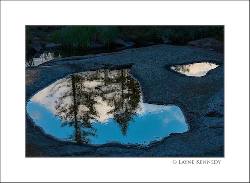 Break water reflection, Grand Marais by Layne Kennedy.
