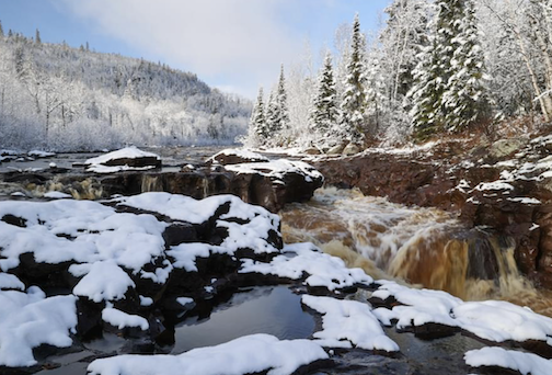 Snowfall on the Temperance River by Thomas Spence.