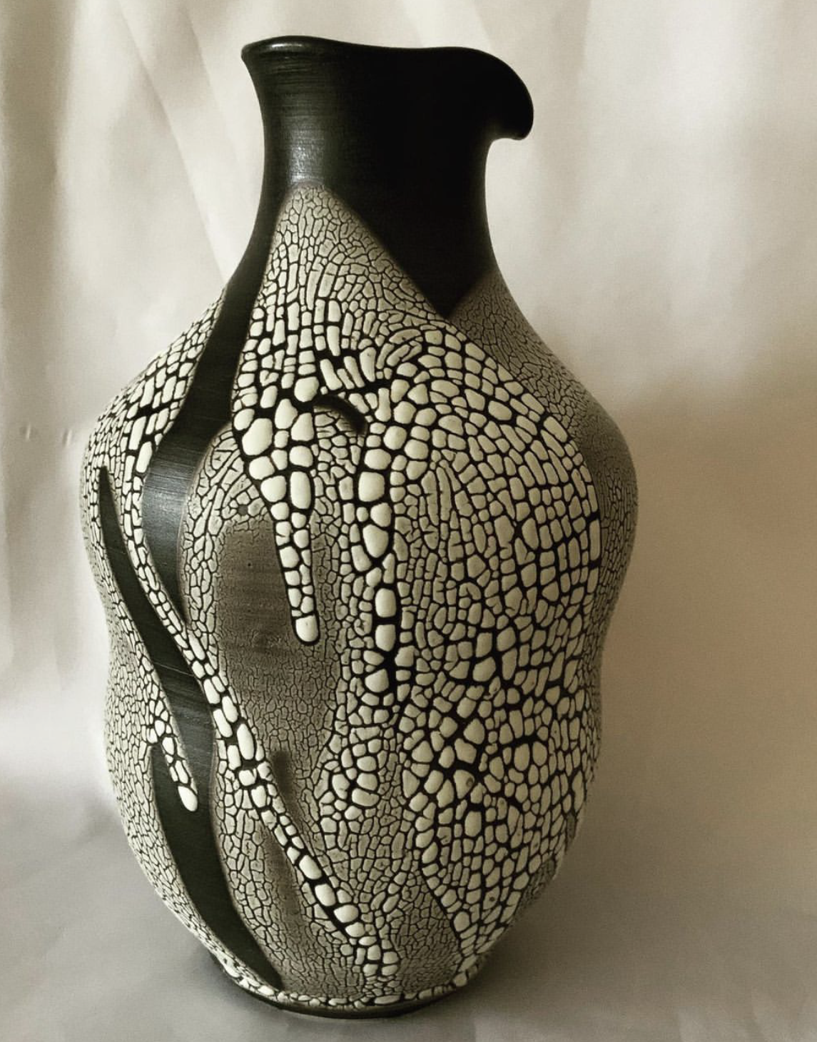 Maggie Anderson made this beautiful piece for the show.on, one of the pieces that will be in the "But Does It Pour" exhibit at the Johnson Heritage Post.