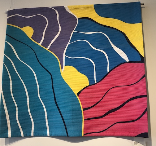 Currents, quilt, by Mary Matthews. She is currenttly exhibiting her quilts at Duluth Pottery and :Tile in the Craft District in :duluth.