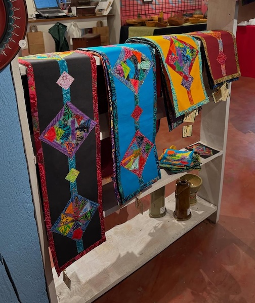 New table runners from Rebecca Speakes from Truth or Consequences New Mexico are now at Betsy Bowen's Studio Gallery.