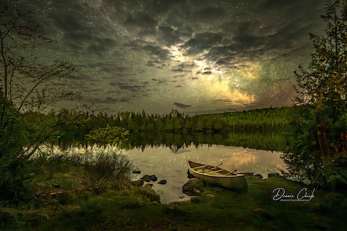 The Milky Way with clouds by Dennis Chick.