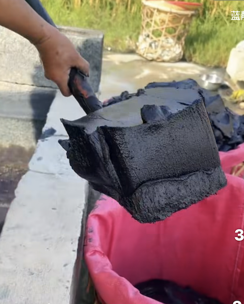 Natural indigo in the making. Click here to see the process.