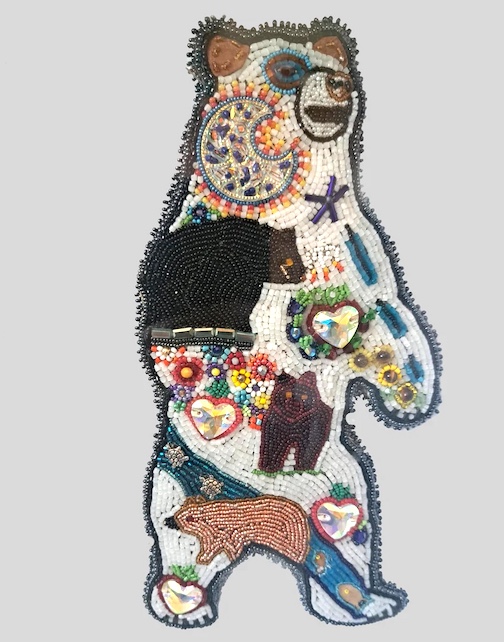 Waabishki Makwa, White Bear - Storyteller, multiple bead sizes by Nancy Kingbird, is one of the works on exhibit.