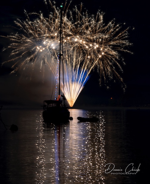 Fireworks over the Grand Marais Harbor, 2025, by Dennis Chick.