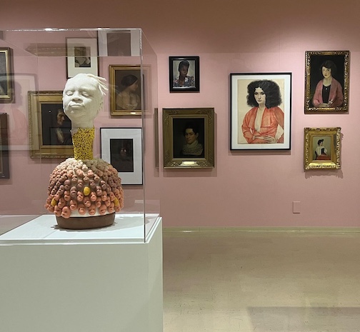 The exhibit, "No Place Like This," is extended through October 11 at the Tweed Museum of Art.