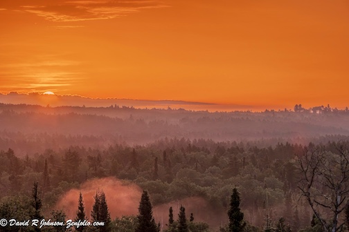 Smoky sunrise by David Johnson.