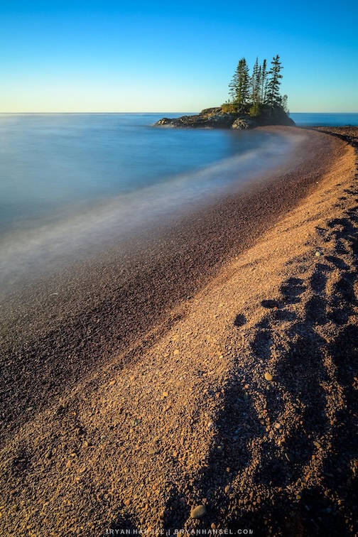 A walk on the beach by Bryan Hansel.