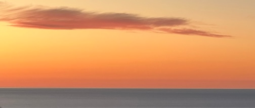 Got up with the sunrise and stretched out with this cloud by Maryl Skinner.