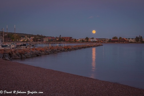 Harvest Moon over Grand Marais by David Johnson.