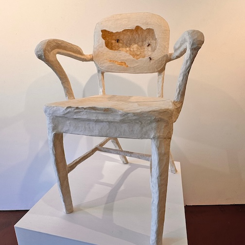 Wasps, a cardboard paper chair, is one of the items exhibited at the Wildish Dove Project. Photo by Carla Stetson.
