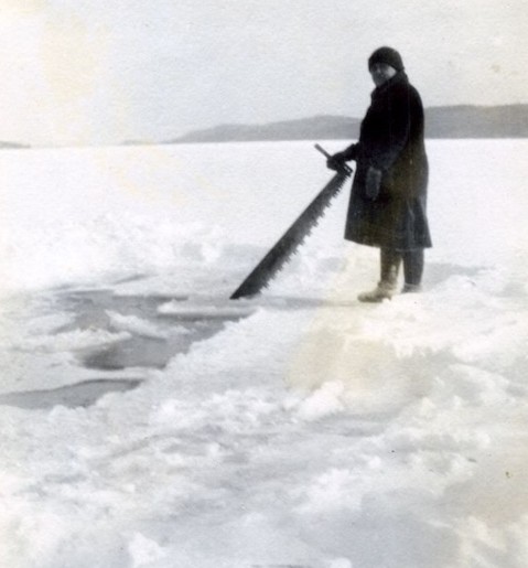 Early ice cutting in the Grand Marais Harbor, year unknown.