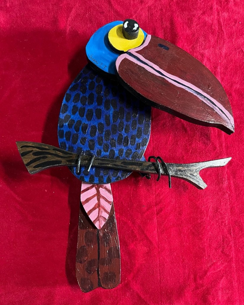 Fun bird crafted from recycled materials by Duane Tougas.