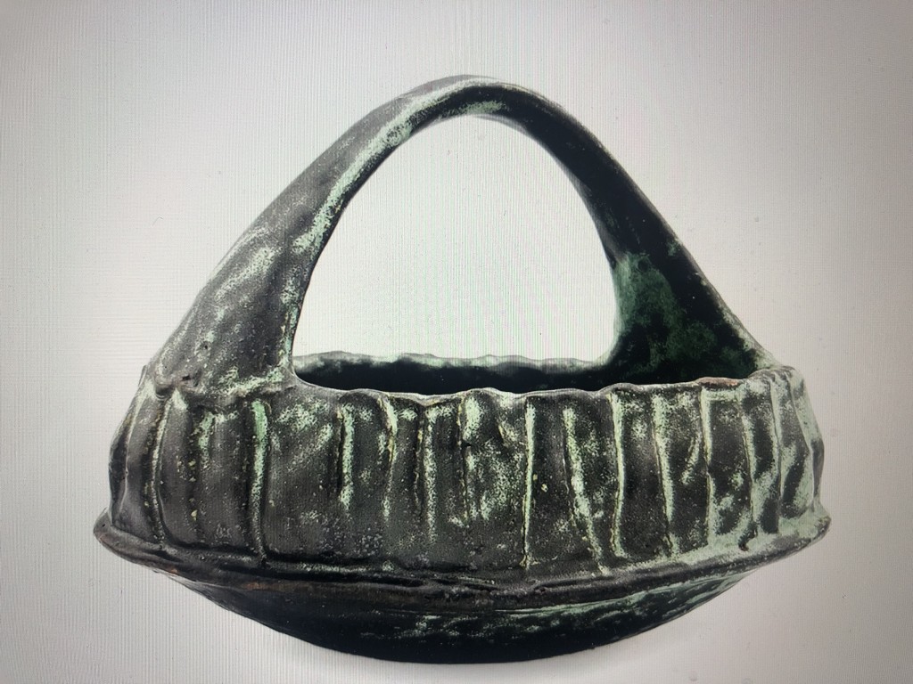 Basket, stoneware, by Jan McKeatchie Johnston. She is exhibiting at the Northrn Clay Center this month.