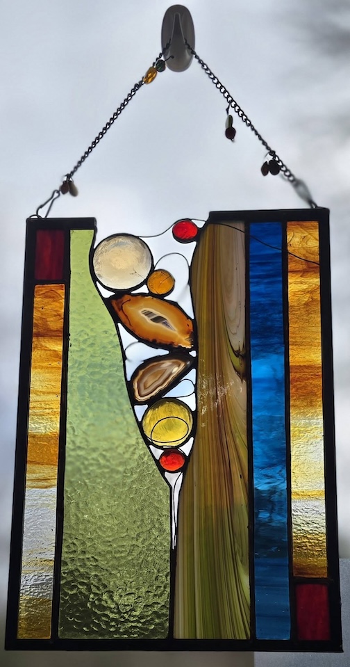 Stained glass window by Terri Kosloske Rothstein.