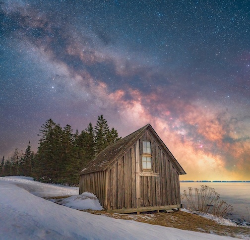 The Milky Way core rising over the north shore by Doug Contrell.