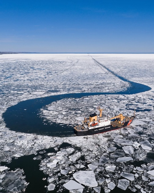 USCG SPAR performs a hard switchback during ice breaking operations on Lake Superior outside the Duluth entry to prepare the first ship of the seasonfor by Nathan Klok.