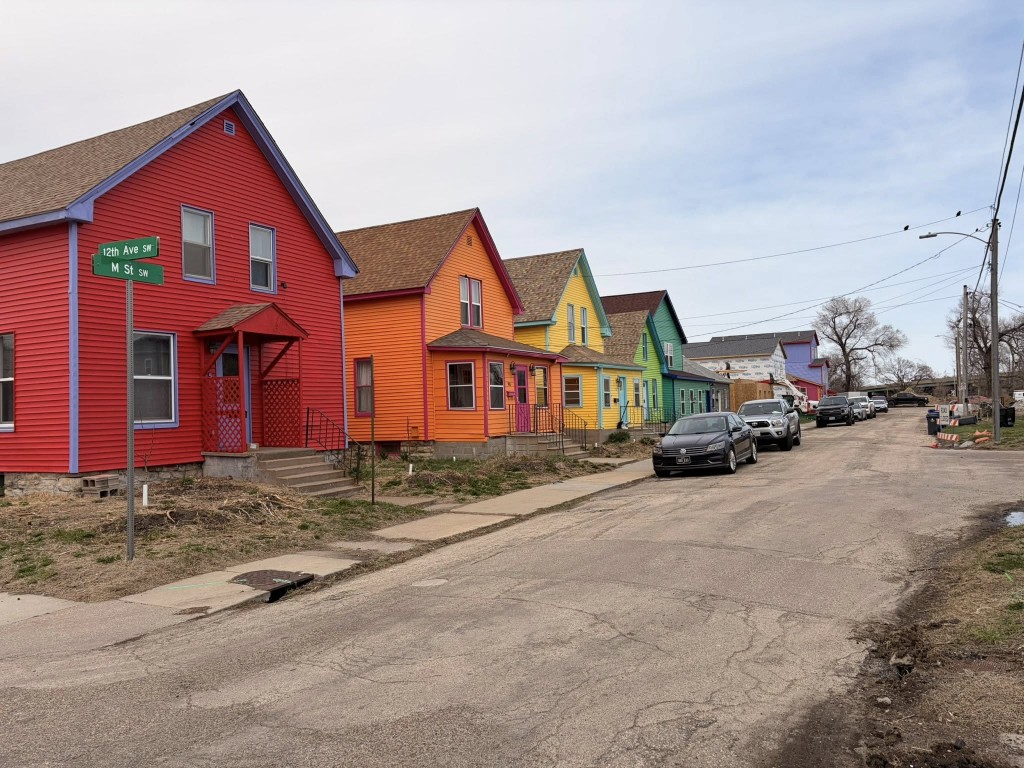 Colorful houses in Cedar Rapids by Chuck Heller.
