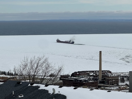Stuck in spring ice in Duluth by Tor Torkildson. Coast Guard to the rescue.