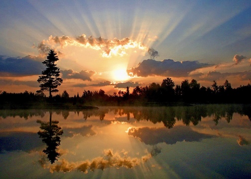 A dawn of a new day by Paul Pluskwik.