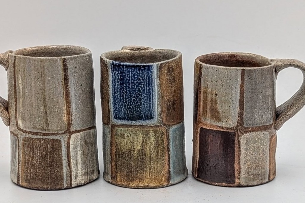 Mugs by Sam Taylor.