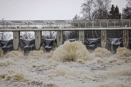 The water around town is very high, by Chris Artist