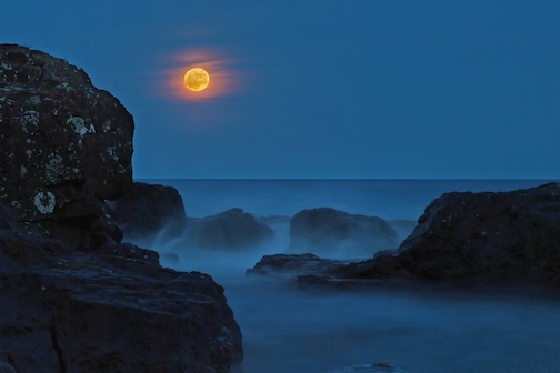 Blue moon over Lake Superior by Chuck Olsen.