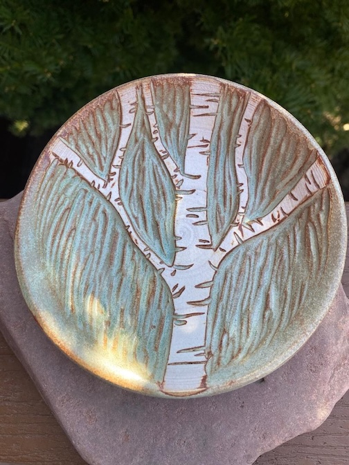Carved plate by Ann Ward.