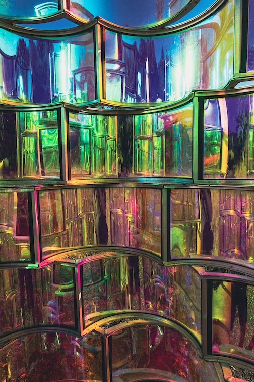 Curved stained glass art installation, artist unknown Photo by Carl Anderson.