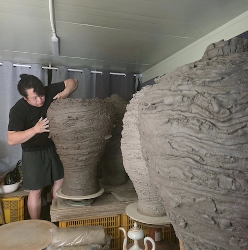 Making vessels with potter Sungho Lee.
