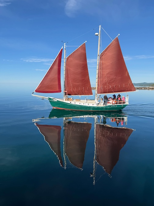 The Hjordis on a glassy Lake Superior by Betsy Bowen.